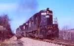 N&W, Norfolk Western  880-899-8074-6155, GR14, on the ex-P&WV at mp6.26, bridge over Eannotti Road, Chaintown, Pennsylvania, March 24, 1982. 